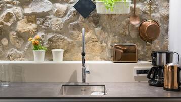 Studio (Studio Apartment) | Private kitchen | Fridge