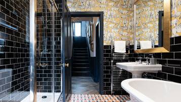 Shower, eco-friendly toiletries, hair dryer, towels
