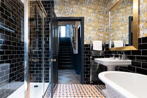 Shower, eco-friendly toiletries, hair dryer, towels