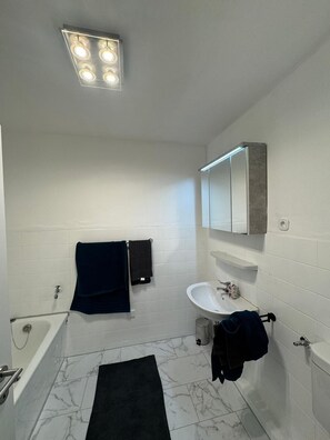 Hair dryer, towels, soap, toilet paper