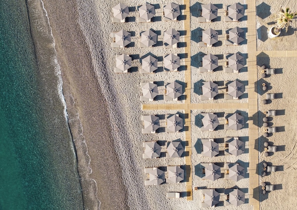 On the beach, free beach cabanas, sun-loungers, beach umbrellas