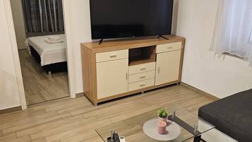 Comfort Apartment, 2 Bedrooms | Living area | Flat-screen TV