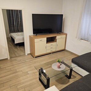 Comfort Apartment, 2 Bedrooms | Living area | Flat-screen TV - Apartment Jadran (Zadar)