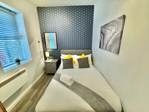 2 habitaciones, tabla de planchar con plancha y wifi gratis