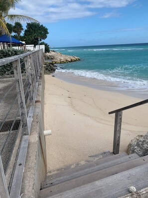 On the beach, sun loungers, beach towels