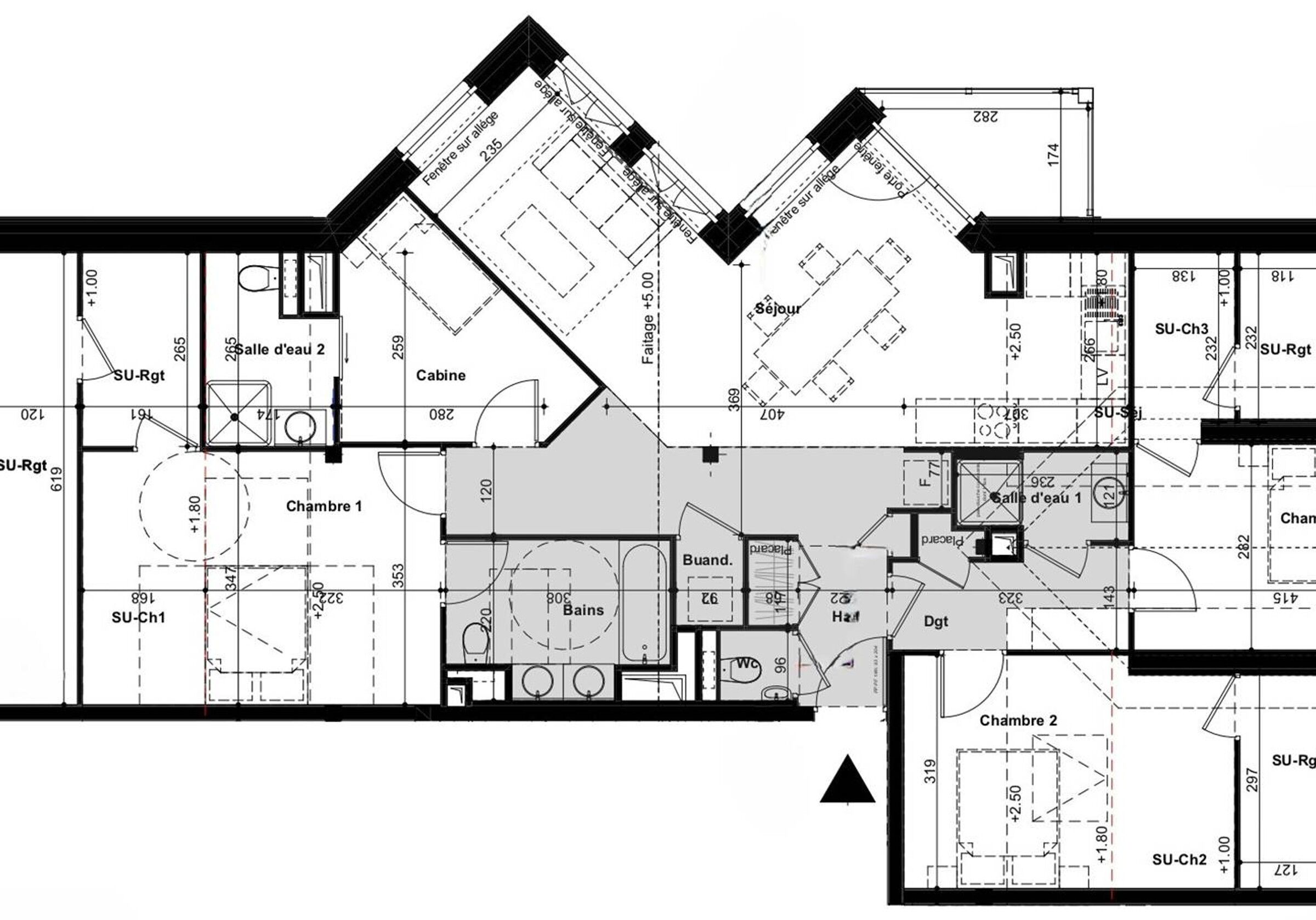 A detailed floor plan of a hotel with multiple rooms, bathrooms, and a kitchen area.