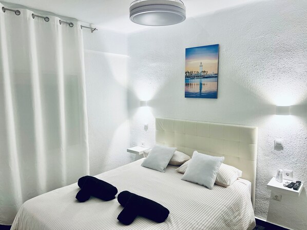 2 chambres, fer et planche à repasser, Wi-Fi, draps fournis