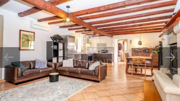 Villa (Two Bedroom Villa) | Living room | 32-inch flat-screen TV with digital channels