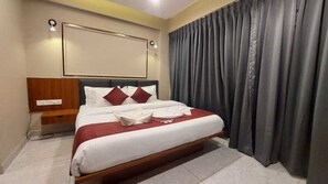Deluxe Room, Balcony, Garden View | Free WiFi
