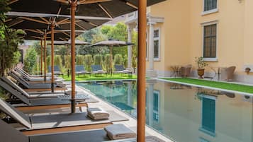 Outdoor pool, pool umbrellas, pool loungers