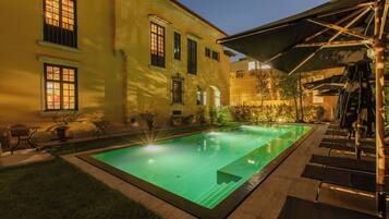 Outdoor pool, pool umbrellas, sun loungers