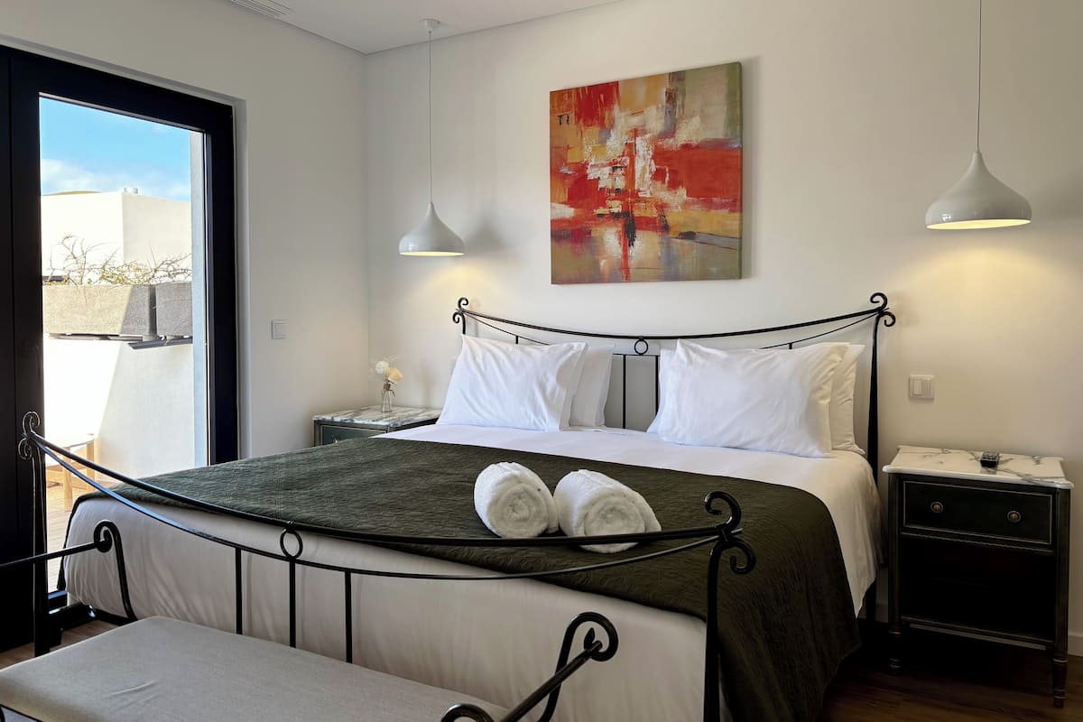 Superior Double Room, 1 King Bed, Balcony, Garden View | 7 bedrooms, in-room safe, individually decorated, individually furnished