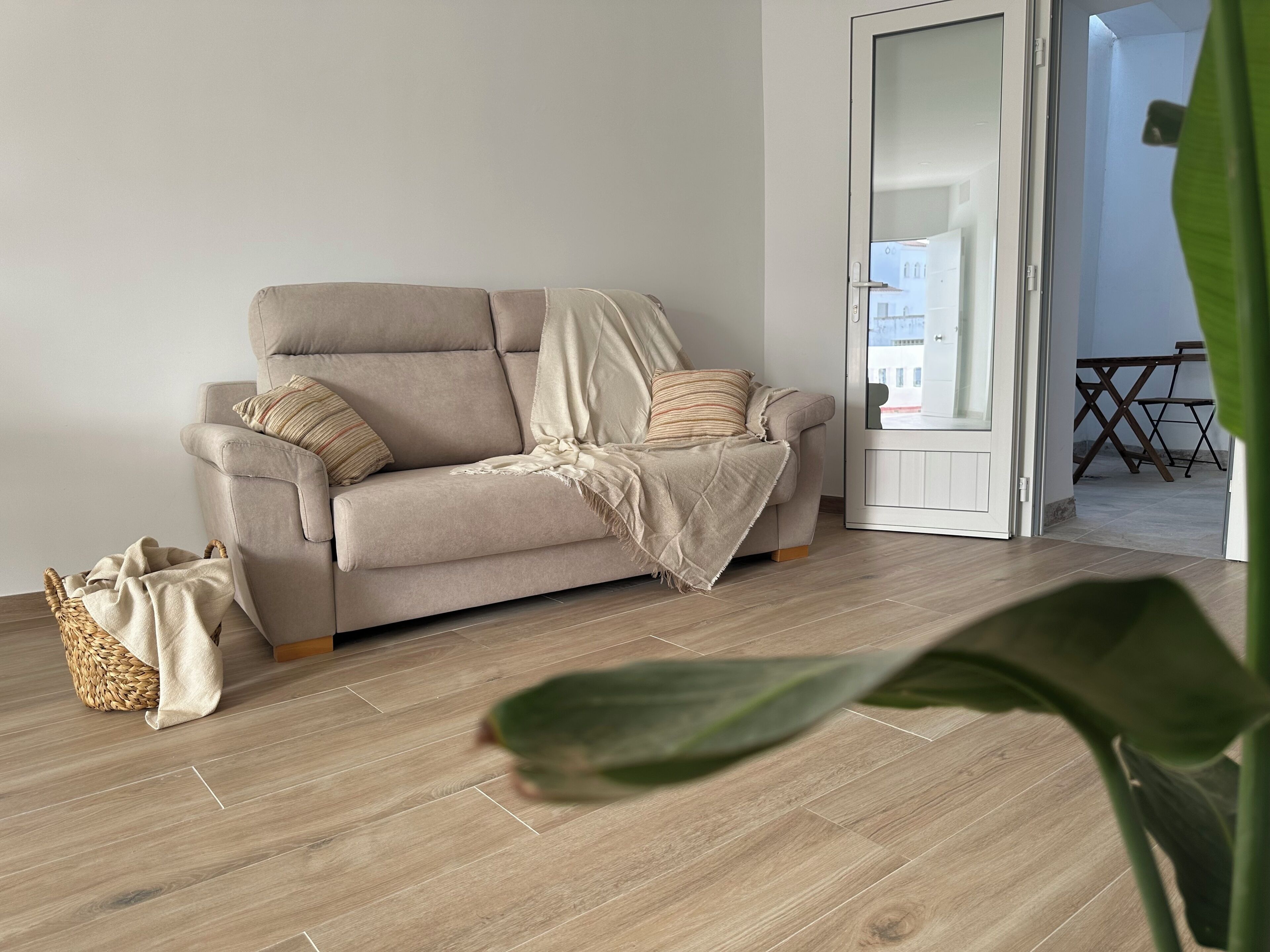 Superior Apartment, Garden View | Living room | Flat-screen TV