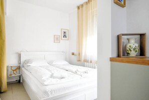 1 chambre, bureau, fer et planche à repasser, accès au Wi-Fi (inclus)