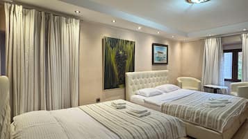 Family Studio, City View | 2 bedrooms, individually decorated, desk, laptop workspace