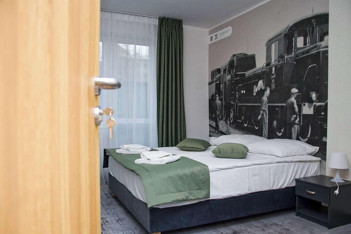 1 slaapkamer, een bureau, een strijkplank/strijkijzer, gratis wifi