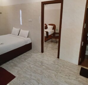 Suite familiare, balcone | Wi-Fi gratuito, lenzuola