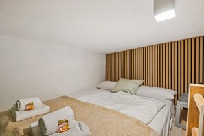 1 bedroom, desk, iron/ironing board, travel cot