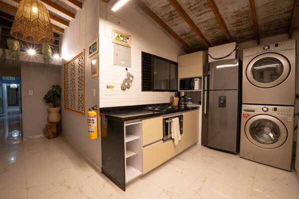 Fridge, microwave, coffee/tea maker, blender