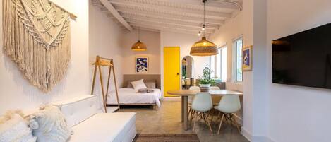 1 bedroom, desk, iron/ironing board, travel crib