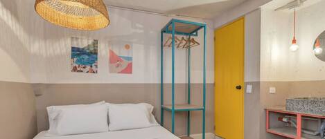 1 bedroom, desk, iron/ironing board, travel crib