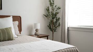 2 dormitorios, tabla de planchar con plancha, cuna de viaje y wifi