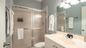 Shower, hair dryer, towels