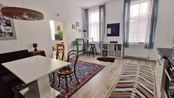 Apartment, Courtyard View | Living area | 80-cm flat-screen TV with digital channels