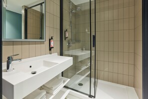 Eco-friendly toiletries, hair dryer, towels, soap