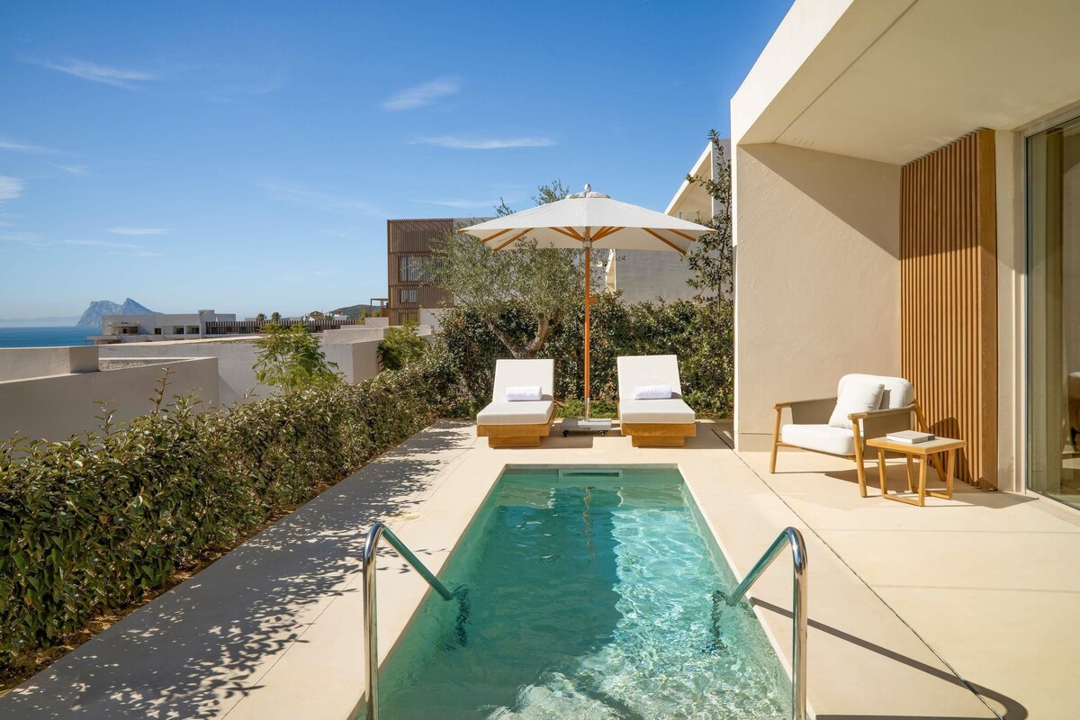 Suite, 1 chambre, vue sur la mer | Draps en coton égyptien, literie de qualité, minibar, bureau