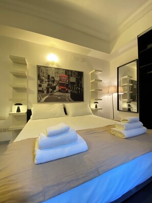 1 habitación, tabla de planchar con plancha, wifi y ropa de cama 