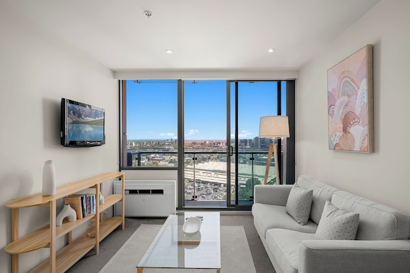 Superior Apartment, 1 Bedroom, Balcony | Living area | Flat-screen TV - City Stays (Melbourne)