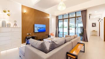 Sabai Jai | Living area | 42-inch Smart TV with digital channels, Netflix, streaming services