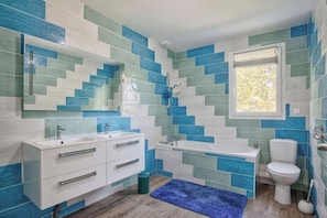 Shower, hair dryer, towels, soap