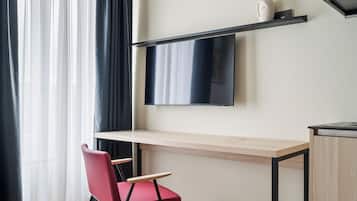 Studio, 2 lits une place, vue cour intérieure | Coin séjour