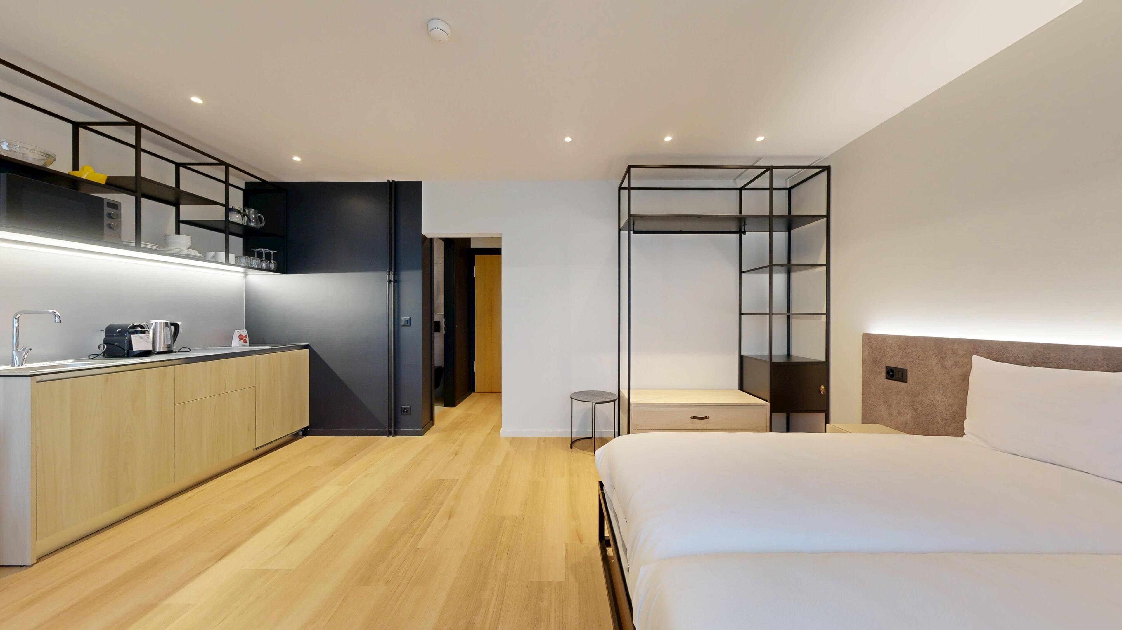 Studio, 2 Single Beds, Courtyard View | Laptop workspace, blackout curtains, iron/ironing board, free WiFi