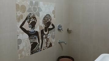 Shower, towels, soap, toilet paper