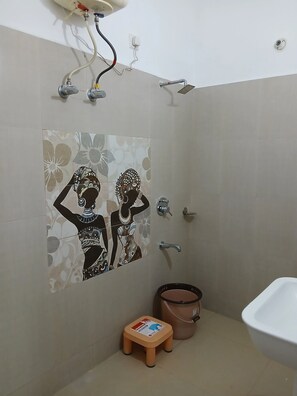 Shower, towels, soap, toilet paper