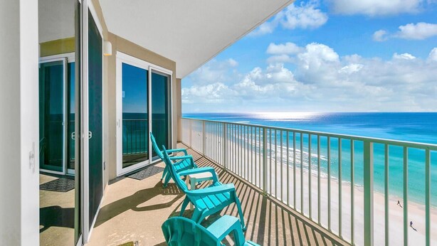 A balcony with a view of the beach and ocean. - Grandview East 1002 (Panama City Beach)