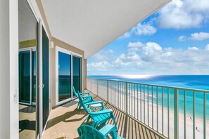 A balcony with a view of the beach and ocean. - Grandview East 1002 (Panama City Beach)