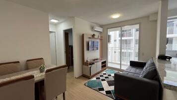 Apartamento conforto | Área de estar | TV de tela plana