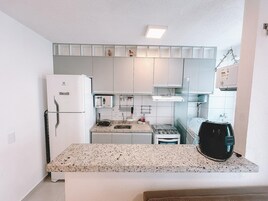 Classic Apartment | Private kitchen | Fridge, microwave, oven, cookware/dishes/utensils