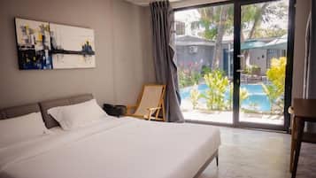 Comfort Room, 1 Double Bed, Non Smoking, Pool View | In-room safe, desk, laptop workspace, blackout curtains