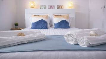 4 bedrooms, desk, iron/ironing board, travel crib