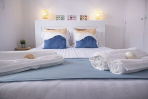 4 bedrooms, desk, iron/ironing board, travel cot