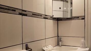 Hair dryer, towels, soap, shampoo