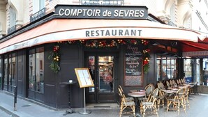 A restaurant with outdoor seating, a sign reading "COMPTOIR de SEVRES," and a menu board outside. - NESTLED IN THE LIVELY AND CHARMING NOTRE-DAME-DES-CHAMPS DISTRICT- RUE DE SEVRES (Paris)