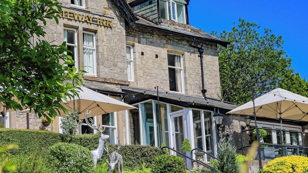 A stone building with a sign reading "The Way Inn". - The Gateway Hotel (Kendal)