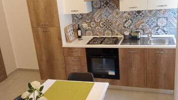 Oven, stovetop, electric kettle, toaster