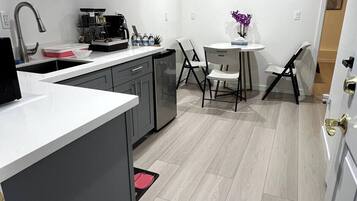 Fridge, microwave, coffee/tea maker, electric kettle